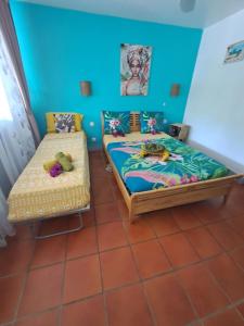 Voodi või voodid majutusasutuse Studio cosy à Saint-François - 21 m² avec balcon et piscine toas +9 fotot