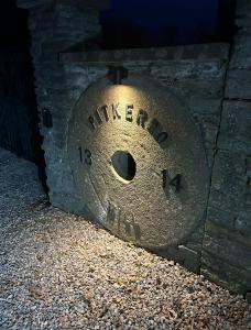 a stone wall with the words villebourg written on it at FLOUR MILL HOUSE at PITKERRO MILL, 4 double bedrooms, TVs, 3 en-suite, separate shower, wc, fully equipped kitchen, games room, large family lounge, private parking, WiFi, private garden and courtyard, long stay rates available through Honeycomb Hosts in Dundee +23 photos