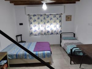 Postel nebo postele na pokoji v ubytování La Margara