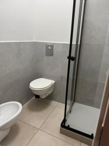 Kúpeľňa v ubytovaní STATION AND AiRPORT ROOM'S