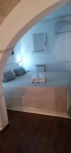 Letto o letti in una camera di Sweet Aura