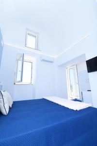 Postel nebo postele na pokoji v ubytování Blue View Luxury Rooms