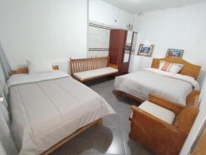 Letto o letti in una camera di HOSTAL La RASA