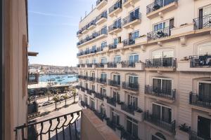 a view from a balcony of a building at Strand view apartment in Sliema