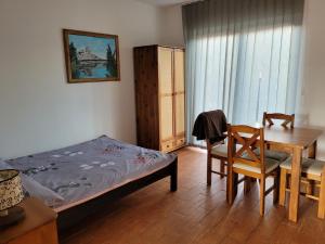 Letto o letti in una camera di Dom Bartek