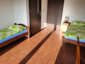 Letto o letti in una camera di Dom Bartek
