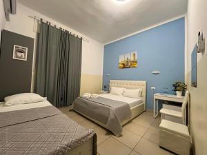 Postel nebo postele na pokoji v ubytování Hello Pisa B&B