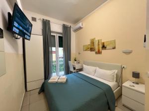 Postel nebo postele na pokoji v ubytování Hello Pisa B&B