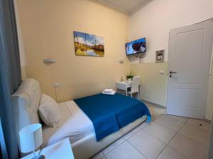 TV a/nebo společenská místnost v ubytování Hello Pisa B&B