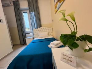 Postel nebo postele na pokoji v ubytování Hello Pisa B&B