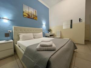 Postel nebo postele na pokoji v ubytování Hello Pisa B&B