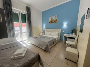 Postel nebo postele na pokoji v ubytování Hello Pisa B&B