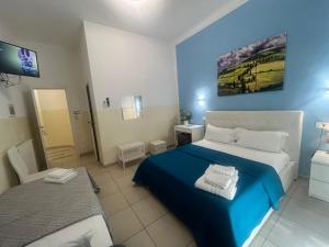 Postel nebo postele na pokoji v ubytování Hello Pisa B&B