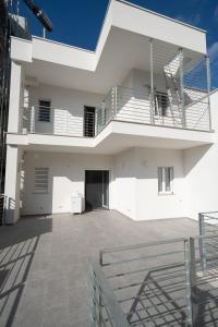 Balkón nebo terasa v ubytování PALAZZO ENNIO
