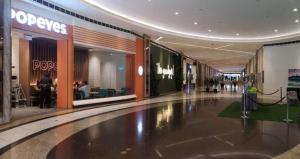 a large shopping mall with a store at The ICONIC: Comfortable living by Awsom Phil in Manila +58 photos