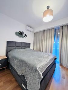 Posteľ alebo postele v izbe v ubytovaní Tivat apartments