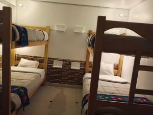 Letto o letti in una camera di HOSTAL La RASA