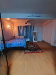 Postel nebo postele na pokoji v ubytování Hotel Ryan
