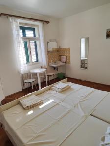 Postel nebo postele na pokoji v ubytování Guesthouse Franko