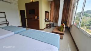 Letto o letti in una camera di Quick Stop Inn