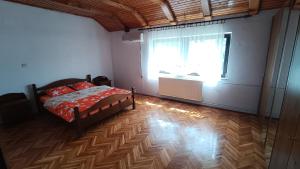 Postel nebo postele na pokoji v ubytování Guesthouse Trikic