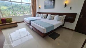 Letto o letti in una camera di Quick Stop Inn