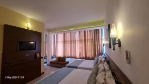 Letto o letti in una camera di Quick Stop Inn