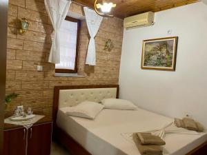 Giường trong phòng chung tại Panoramic View Guest House