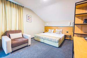 Postel nebo postele na pokoji v ubytování Hotel Albatros New Town