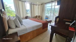 Letto o letti in una camera di Quick Stop Inn