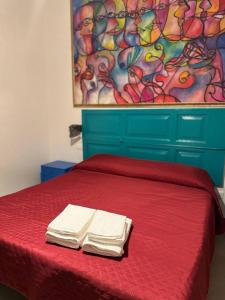 Postel nebo postele na pokoji v ubytování Ulivi di Minerva - Boutique Holiday Home - Ostuni - Fasano - Cisternino