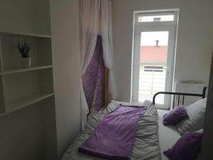 Postel nebo postele na pokoji v ubytování Apartmán U vody