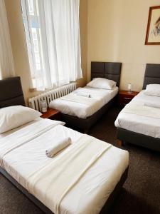 Posteľ alebo postele v izbe v ubytovaní Hotel Lubavia
