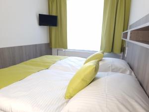 Una cama o camas en una habitación de Relax apartmán Pod Javorem