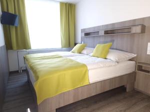 Postel nebo postele na pokoji v ubytování Relax apartmán Pod Javorem + 28 fotografií