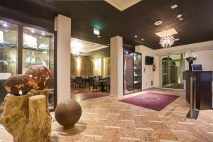 TV a/nebo společenská místnost v ubytování Hotel Norge
