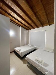 Postel nebo postele na pokoji v ubytování Apartamento 501