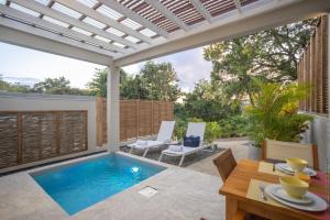Bassein majutusasutuses Cocoonhuts Résidences Martinique või selle lähedal
