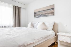 Postel nebo postele na pokoji v ubytování SOHO 9 !Gratis Parken, Free Parking! + 3 fotografie