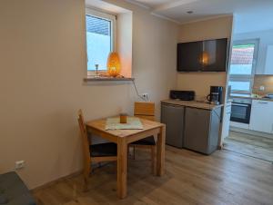 Kuchyň nebo kuchyňský kout v ubytování Ferienwohnungen Schallenberg Fewo Nr 6