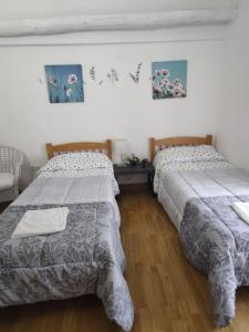 Postel nebo postele na pokoji v ubytování Albergue Vive tu Camino