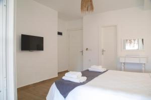 A bed or beds in a room at LONDİA OTEL