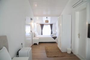 A bed or beds in a room at LONDİA OTEL
