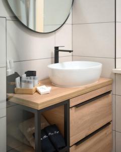 a bathroom with a sink and a mirror at Apartment Mama Marija in Hvar +41 photos