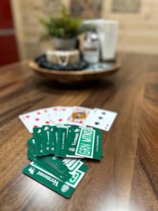 a pair of playing cards sitting on a table at Brook Haven Retreat - Minutes to Mt Snow / Stratton, Pet Friendly! in Wardsboro