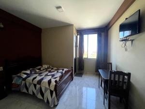 Foto dalla galleria di HOSTAL GALO a Tarija Altre 23 foto