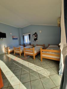 Postel nebo postele na pokoji v ubytování Pool Apartments Knežević