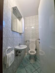 Koupelna v ubytování Pool Apartments Knežević