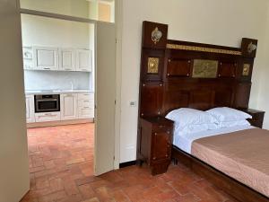 Ліжко або ліжка в номері Hotel Palazzo Costa