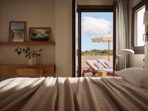 A bed or beds in a room at Cielo villas - An Authentic Mediterranean Living